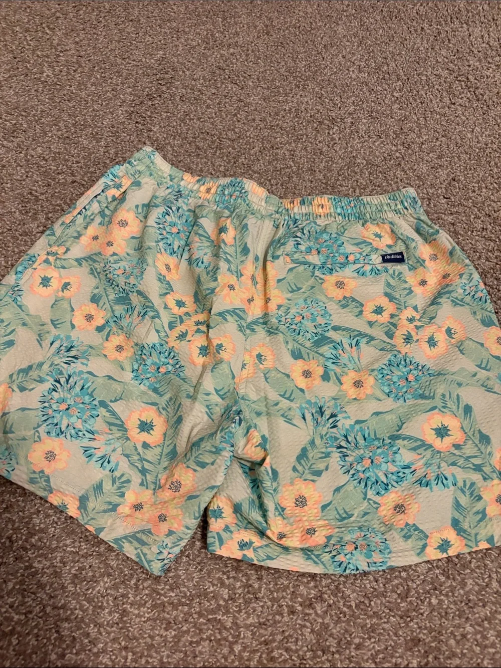 chubbies Men's Teal Floral Swim Trunks with Yellow Accents
